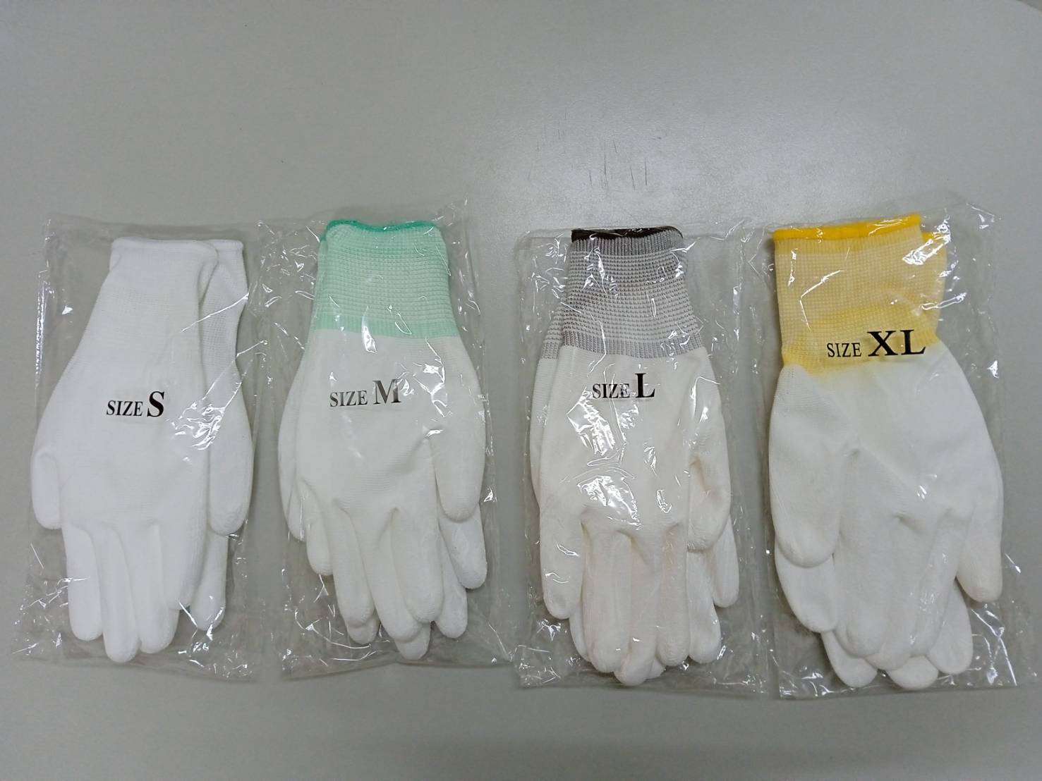 7.F-13PI 13針白PU掌心手套